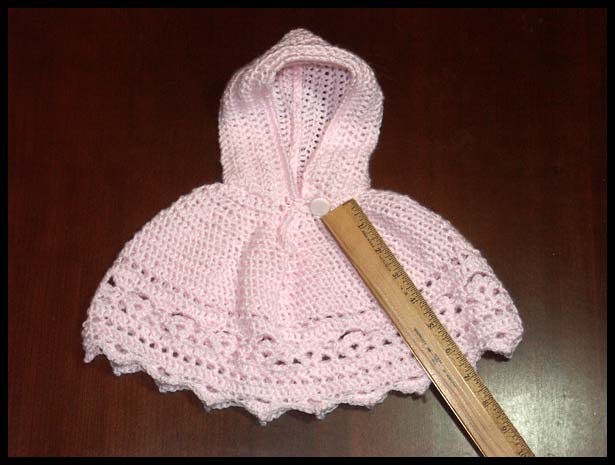 Pink Hooded Poncho with Ruler
